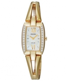 This solar-powered watch by Seiko shines with a golden bangle bracelet adorned with shimmering details. This solar-powered watch by Seiko shines with a golden bangle bracelet adorned with shimmering details.