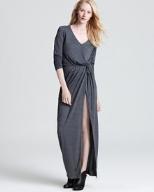 In draped jersey, this Thakoon Addition maxi dips at the neckline and flaunts a climbing slit at the skirt for an alluring look spiked with modern edge.