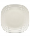 With the look of hand-thrown pottery in hard-wearing stoneware, the Swirl square salad plate from Mikasa enhances casual meals with fuss-free elegance. A matte finish with glazed accents adds stylish distinction to pure white.