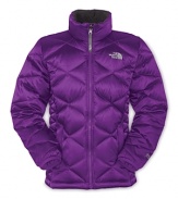 A compact puffer with a diamond quilted shell, stand collar and elastic gathers at the cuff for a sleek, warm style.