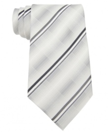 Kenneth Cole Reaction adds modern minimalism to the gradient grid tie, making it a cool update for your Monday through Friday routine Kenneth Cole Reaction adds modern minimalism to the gradient grid tie, making it a cool update for your Monday through Friday routine