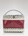 Swap that dopp kit for Tory Burch's generously sized cosmetics case. With a delicate logo and bold, contrasting prints, it's an on-trend travel mate.