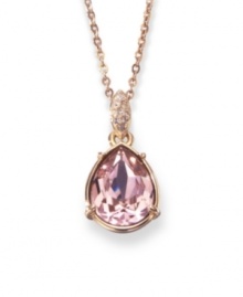 Fit for a princess, this dazzling Lime pendant from Swarovski enchants. In rhodium-plated mixed metal with rose-colored crystal at center surrounded by crystal pave. Approximate length: 15 inches. Approximate drop: 1 inch.