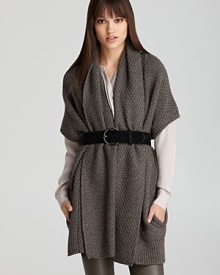 Vince epitomizes laid-back luxury with this ultra-cozy sweater, tailored in a roomy silhouette with side pockets. Vince epitomizes laid-back luxury with this ultra-cozy sweater, tailored in a roomy silhouette with side pockets.