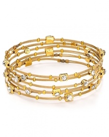 The Seasonal Whispers girl loves to stack the brand's beautifully eclectic bracelets. This set is studded with Swarovski crystal stations and gold tone inserts, creating a cool textured statement.