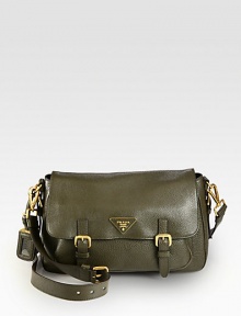 Crossbody design of supple leather with metal logo and hardware.Detachable adjustable shoulder strap, 20-22 dropBuckled flap closureOne outside open pocketOne open pocket under flapOne inside zip pocketOne inside open pocketSignature jacquard lining13W X 7½H X 4DMade in Italy Crossbody design of supple leather with metal logo and hardware.Detachable adjustable shoulder strap, 20-22 dropBuckled flap closureOne outside open pocketOne open pocket under flapOne inside zip pocketOne inside open pocketSignature jacquard lining13W X 7½H X 4DMade in Italy