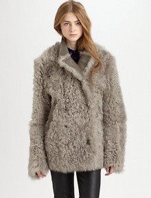 Alarmingly chic jacket of plush shearling has a double-breasted front and soft leather trim. Notched leather collarDouble-breasted button frontLong sleevesDual slash pockets with leather trimAbout 31 from shoulder to hemLamb leather with genuine washed and dyed shearlingFur origin: TurkeyDry clean with fur specialistImportedModel shown is 5'10 (177cm) wearing US size 4. Alarmingly chic jacket of plush shearling has a double-breasted front and soft leather trim. Notched leather collarDouble-breasted button frontLong sleevesDual slash pockets with leather trimAbout 31 from shoulder to hemLamb leather with genuine washed and dyed shearlingFur origin: TurkeyDry clean with fur specialistImportedModel shown is 5'10 (177cm) wearing US size 4.