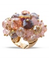 Shimmer to last all day till cocktail hour. c.A.K.e. by Ali Khan's standout cluster ring highlights glass beads in rose-colored hues. Set in gold tone mixed metal. Ring adjusts to fit finger.