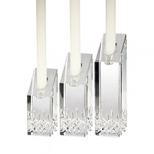 Updated with striking shapes, these candlesticks retain the classic details of the iconic Waterford Lismore pattern for an alluring display of crystal and candlelight. Updated with striking shapes, these candlesticks retain the classic details of the iconic Waterford Lismore pattern for an alluring display of crystal and candlelight.