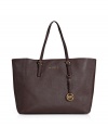 Elegant calf leather bag in rich, espresso brown - Sophisticated with simple, clean lines - Trendy shopper shape is spacious - Features two inside pockets, one lockable - Two thin, adjustable handles with gold-colored buckles - Michael Kors logo and charm - Perfect bag of work, school and errands