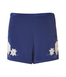 Feminine shorts in pure blue silk - Soft lace-like embroidered floral details add interest - Side zip and single button closure - Two small pockets at back - Flat front and straight cut creates a relaxed, chic silhouette - Pair with wedged heels, a soft blouse in a trendy pastel color, and chunky gold jewelry