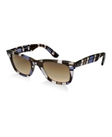 This unique print is inspired by themes that represent the essence of Ray-Ban's history and style. The Ray-Ban Color Block print was influenced by the pop art style of Mondriaan. Using the same shape and style introduced in the '60s, the brown Wayfarer with brown, gradient lenses will get you noticed. This unique print is inspired by themes that represent the essence of Ray-Ban's history and style. The Ray-Ban Color Block print was influenced by the pop art style of Mondriaan. Using the same shape and style introduced in the '60s, the brown Wayfarer with brown, gradient lenses will get you noticed.