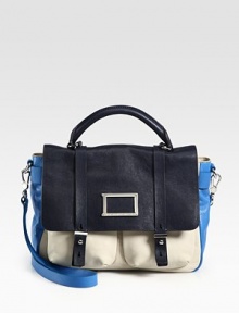 Leather colorblocked must-have crafted in a roomy silhouette for your everyday necessities. Top handle, 4½ dropRemovable adjustable shoulder strap, 16¼-20 dropSnap closure on front flapTwo outside open pocketsOne inside zip pocketTwo inside open pocketsLogo-print lining11W X 9½H X 3¾DImported Leather colorblocked must-have crafted in a roomy silhouette for your everyday necessities. Top handle, 4½ dropRemovable adjustable shoulder strap, 16¼-20 dropSnap closure on front flapTwo outside open pocketsOne inside zip pocketTwo inside open pocketsLogo-print lining11W X 9½H X 3¾DImported