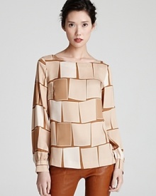 A three-dimensional square print decorates this silk Escada top for eclectic chic. A three-dimensional square print decorates this silk Escada top for eclectic chic.