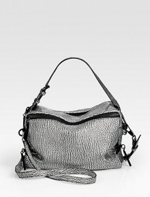 Pebble-grain leather takes on a metallic sheen in this travel-ready zip-top carryall.Adjustable detachable top handle, 4½-8 dropAdjustable detachable shoulder strap, 24-27 dropTop-zip closureOne outside zip pocketOne inside zip pocketFully lined10W X 6H X 3½DImported Pebble-grain leather takes on a metallic sheen in this travel-ready zip-top carryall.Adjustable detachable top handle, 4½-8 dropAdjustable detachable shoulder strap, 24-27 dropTop-zip closureOne outside zip pocketOne inside zip pocketFully lined10W X 6H X 3½DImported