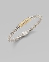 From the Embrace Collection. Dazzling diamonds in radiant 18k gold wrapped around beaded sterling silver for a modern yet romantic piece.Diamonds, .29 tcw18k goldSterling silverDiameter, about 2¼Box clasp closureImported