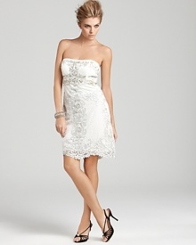 Rich embroidery and ornate beading create a look of pure opulence on this short and sweet Sue Wong strapless dress. Rich embroidery and ornate beading create a look of pure opulence on this short and sweet Sue Wong strapless dress.