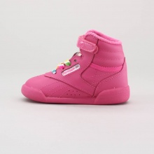 Now little girls can celebrate the 30th anniversary of this classic sneaker with the reign-bow edition. Features a brightly colored leather upper, adjustable strap, rainbow colored laces & a non-marking rubber outsole. Imported. Now little girls can celebrate the 30th anniversary of this classic sneaker with the reign-bow edition. Features a brightly colored leather upper, adjustable strap, rainbow colored laces & a non-marking rubber outsole. Imported.