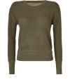 Reminiscent of that favorite thermal, Marc by Marc Jacobs waffle knit wool pullover is a cool choice destined to be an everyday favorite - Round neckline, long sleeves, smooth trim, allover waffle knit - Shorter, fitted silhouette - Wear with a tee and favorite skinny jeans