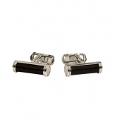 Add a gentlemanly accent to your formal look with these luxe cufflinks from Neil Barrett - Silver-tone cylindrical cufflinks with leather inlay - Pair with a slim suit and a patterned button down