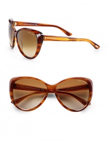 A chic, acetate design with a beveled rim and logo temples. Available in shiny striped brown with brown gradient lens. Logo temples100% UV protectionMade in Italy A chic, acetate design with a beveled rim and logo temples. Available in shiny striped brown with brown gradient lens. Logo temples100% UV protectionMade in Italy
