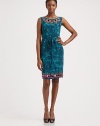 Tie-dyed silk and beaded embroidery lend a touch of boho flair to this fitted sheath.BoatneckSleevelessSelf-beltPrincess seamsCenter back zipperAbout 24 from natural waistSilkDry cleanImported