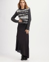 Floor-length confection with a semi-sheer side panel, drawstring waistband and asymmetrical hem. Drawstring waistband Semi-sheer side panel Asymmetrical hem About 34 from natural waist 95% viscose/5% spandex Machine wash ImportedModel shown is 5'9½ (176cm) wearing US size Small. 