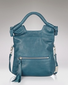 Go contemporary cool with Foley + Corinna's supple leather crossbody bag. Go contemporary cool with Foley + Corinna's supple leather crossbody bag.