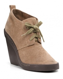 Bold new basics. These suede wedges are your casual fall go-to shoe. Pretty them up with patterned tights or rough them up with distressed denim. By DKNY. Bold new basics. These suede wedges are your casual fall go-to shoe. Pretty them up with patterned tights or rough them up with distressed denim. By DKNY.
