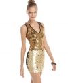 XOXO's dress sparkles the night away! Wear it with high heels to increase the impact.