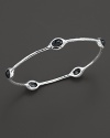 From the Silver collection, five black onyx stations on a hammered bangle in sterling silver. Designed by Ippolita.