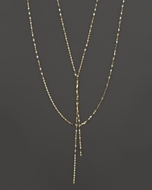 This twisted, glittering gold chain is perfect for adding delicate drama to any look. From Lana.