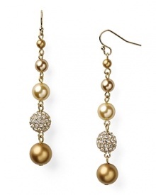 For the golden girl, Carolee's pearl and stone drop-earrings are a versatile jewelry-box style. Wear the lustrous pair with both day and evening looks to turn heads.