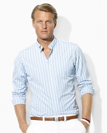 A trim-fitting shirt is crafted from silky cotton poplin in an end-on-end weave with sleek stripes for refined polish. A trim-fitting shirt is crafted from silky cotton poplin in an end-on-end weave with sleek stripes for refined polish.