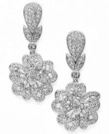 Evening gown...check. Clutch...check. Accessories...check! Take your special occasion to a whole new level with Eliot Danori's dazzling Plumeria earrings. Sparkling round-cut crystals decorate a teardrop and flower shape set in silver tone mixed metal. Approximate drop: 1-1/2 inches. Evening gown...check. Clutch...check. Accessories...check! Take your special occasion to a whole new level with Eliot Danori's dazzling Plumeria earrings. Sparkling round-cut crystals decorate a teardrop and flower shape set in silver tone mixed metal. Approximate drop: 1-1/2 inches.