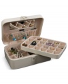 Beautiful inside and out, the Remy jewelry box houses innumerable trinkets between a lift-out drawer, divided sections and in-lid catch. A rich faux leather exterior and sparkling crystal snap add elegance to the practical storage solution by Mele & Co.