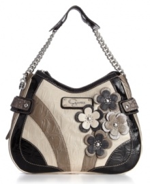 GUESS updates retro style with this adorably floral, high-contrast hobo bag: croc embossing, contrast bands and a sexy silhouette. GUESS updates retro style with this adorably floral, high-contrast hobo bag: croc embossing, contrast bands and a sexy silhouette.