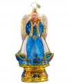 A sweet angel holds her hands in prayer in this beautiful, hand-painted ornament set in the time-honored style of Christopher Radko.