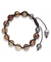 Spiritual-inspired bracelets are all the rage this season! Snap up this hot style from Ali Khan featuring semi-precious natural agate beads and a silver tone skull bead on a trendy black cord. Bracelet adjusts to fit the wrist. Approximate diameter: 2 inches. Approximate length: 12-1/4 inches.