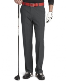 Take the green in comfort and style with these flat-front golf pants from Izod.