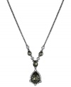 Front and center in fashion. Givenchy shines with this Y-shaped necklace crafted from hematite-tone mixed metal with glass stones adorning it. The pendant glistens with cubic zirconia accents. Approximate length: 16 inches + 2-inch extender.