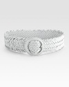 A wide swath of woven nappa leather, finished with a round covered buckle.3 wideNappa leatherMade in Italy