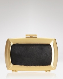 The party-perfect clutch from BCBGMAXAZRIA has a wild-child quality about it. The party-perfect clutch from BCBGMAXAZRIA has a wild-child quality about it.