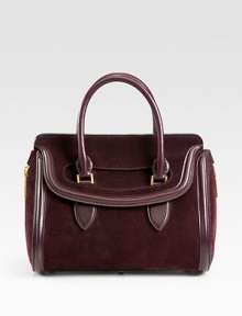 An elegant style in soft suede accented in smooth leather with expandable side zippers.Double leather top handles, 4¼ dropFlap closureProtective metal feetOne inside zip pocketTwo inside open pocketsLeather lining12W X 11½H X 3½DMade in Italy An elegant style in soft suede accented in smooth leather with expandable side zippers.Double leather top handles, 4¼ dropFlap closureProtective metal feetOne inside zip pocketTwo inside open pocketsLeather lining12W X 11½H X 3½DMade in Italy