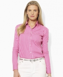 A feminine interpretation of classic menswear style, this petite Lauren by Ralph Lauren shirt is tailored for polished elegance in crisp cotton broadcloth with bright variegated stripes. A feminine interpretation of classic menswear style, this petite Lauren by Ralph Lauren shirt is tailored for polished elegance in crisp cotton broadcloth with bright variegated stripes.