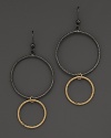 Striking, elegant hoops of black and yellow gold. By Lana.