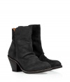 With a modernized take on the classic Victorian ankle boot, this stylishly distressed version from Fiorentini & Baker is a new-season must-have - Round upturned toe, chunky stacked heel, slightly wrinkled upper, tonal stitching, exposed side zip closure - Runs large, so order a size down- Wear with skinny jeans, a mini-dress, or a boho-inspired frock