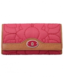 Quilted to perfection. This unique wallet by Fossil features a fun quilted exterior accented with vibrant signature plaque at front. Keep organized with its functional interior and easy access pockets for on-the-go style. Quilted to perfection. This unique wallet by Fossil features a fun quilted exterior accented with vibrant signature plaque at front. Keep organized with its functional interior and easy access pockets for on-the-go style.