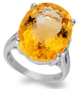 Richly colored with plenty of sparkle, this fun, bright ring features a dramatic oval-cut citrine (14-9/10 ct. t.w.) set in sterling silver. Size 7.