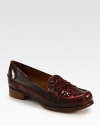 A classic wardrobe leather staple with signature woven detailing. Stacked heel, 1 (25mm)Leather upperLeather lining and solePadded insoleMade in ItalyOUR FIT MODEL RECOMMENDS ordering one half size up as this style runs small. 